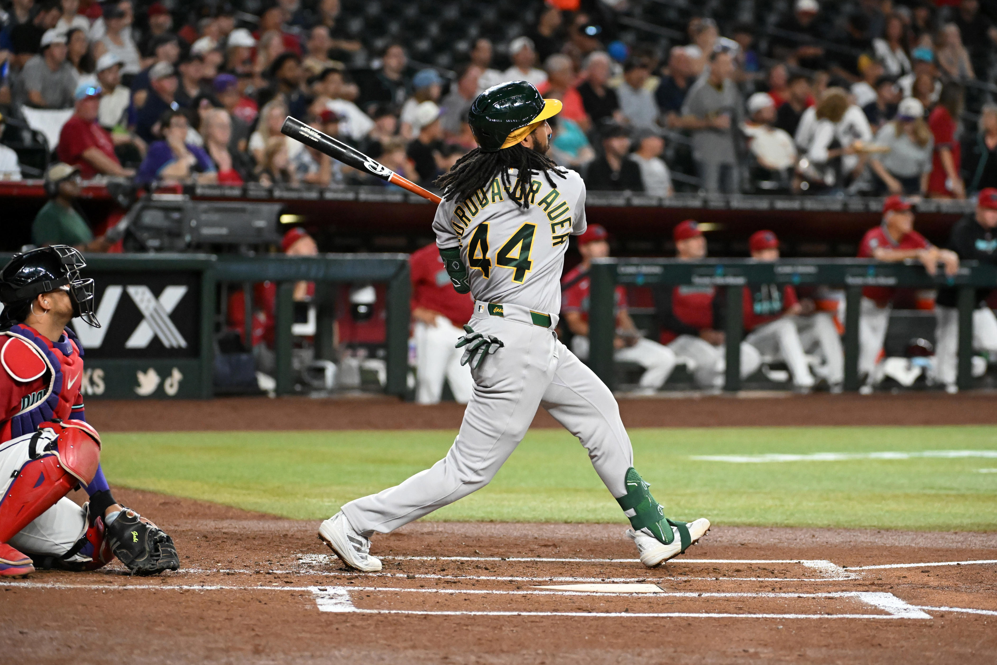 PHOENIX, ARIZONA - JULY 20: Joshua Kuroda-Grauer #44 of the Athletics hits a solo home run against the Arizona Diamondbacks during the second inning at Chase Field on July 20, 2026 in Phoenix, Arizona. It was Kuroda-Grauer's first career MLB home run. (Photo by Norm Hall/Getty Images)