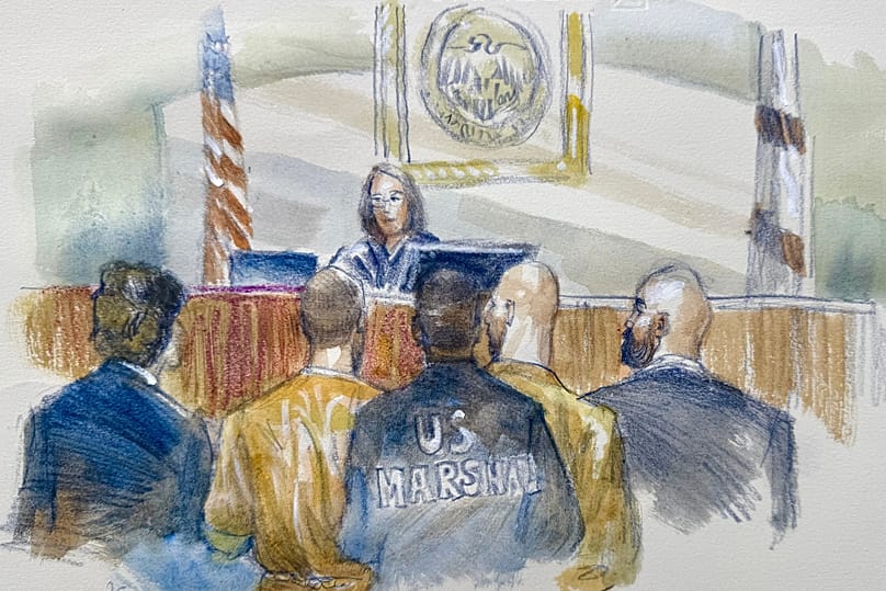 Andrew and Tristan Tate appeared with their attorneys before judge Lauren Louis in Miami federal court. 20 July, 2026. (Lothar Speer via AP)