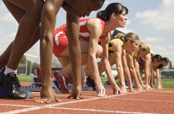 Women athletes competing; Sir Travel Alot / Shutterstock