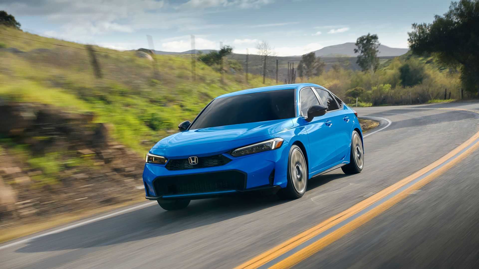 2025 Honda Civic Sport Hybrid front driving shot