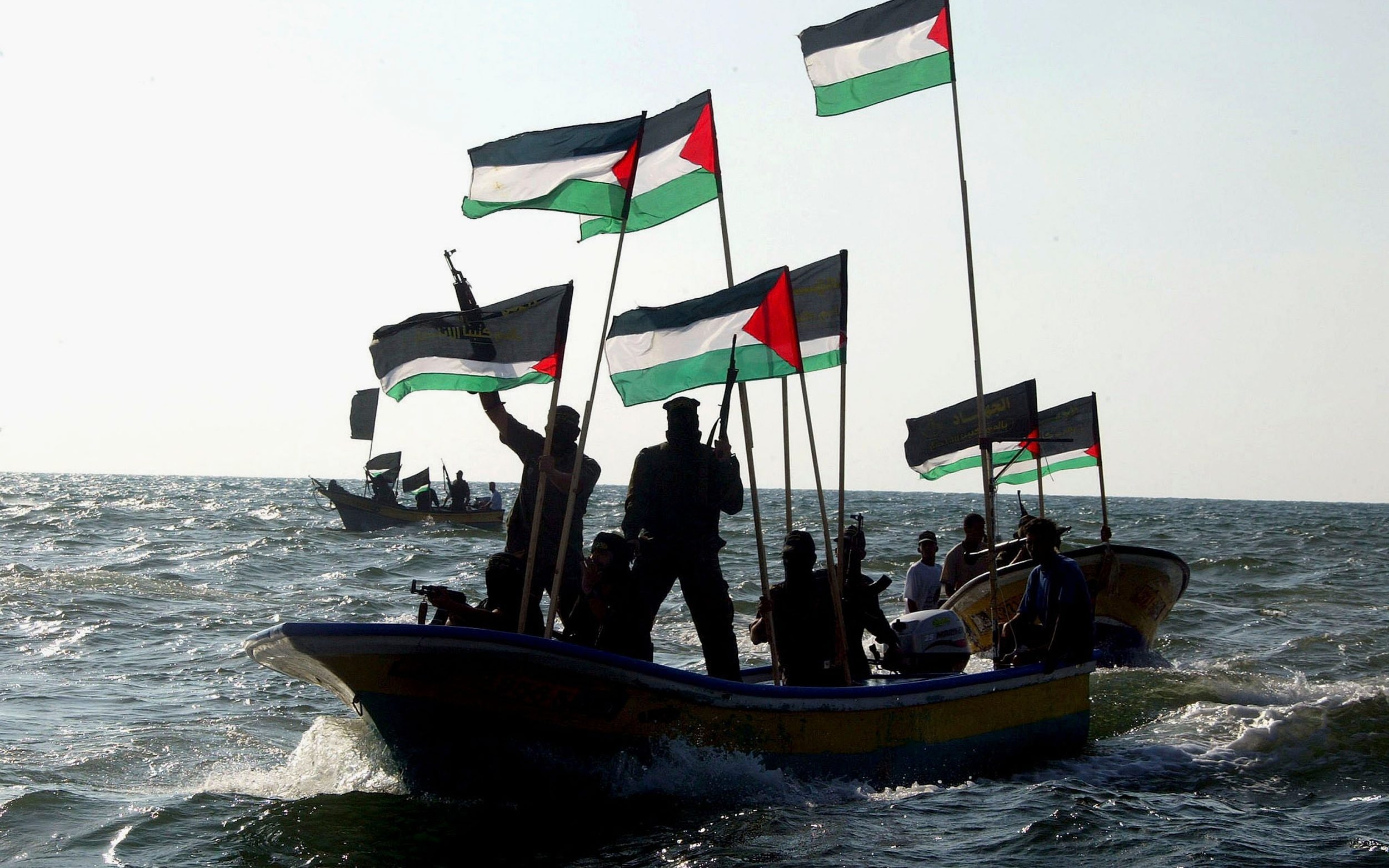 August 2005: Palestinian militants celebrate Israeli withdrawal from the Gaza settlements