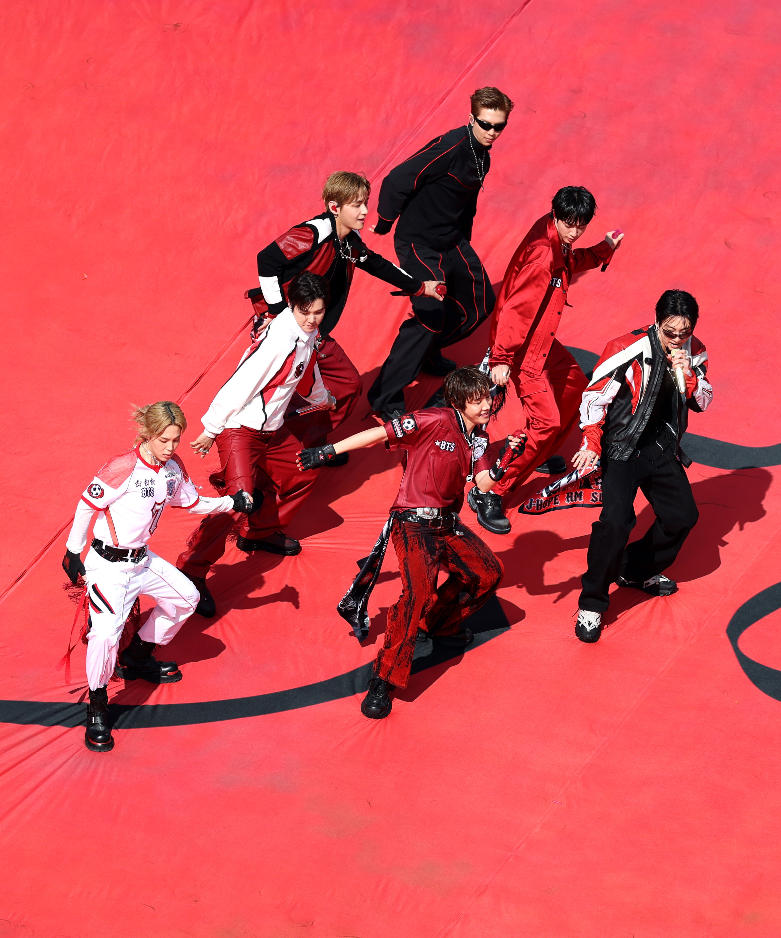 EAST RUTHERFORD, NEW JERSEY - JULY 19: RM, Jin, Suga, J-Hope, Jimin, V and Jung Kook of BTS perform during the Topps Final Halftime Show in the FIFA World Cup 2026 Final match between Spain and Argentina at New York New Jersey Stadium on July 19, 2026 in East Rutherford, New Jersey. (Photo by Al Bello/Getty Images)