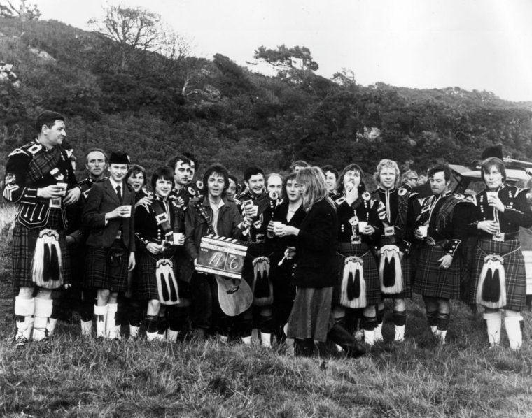 Paul and Linda McCartney with the Cambelton pipe band during the filming of the video for the Wings song 'Mull of Kintyre' in 1977 (Photo: Keystone/Getty Images)
