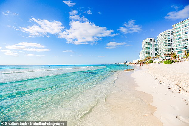 A British tourist has drowned after being swept away by strong waves in the Mexican resort of Cancun. File image of a beach in Cancun