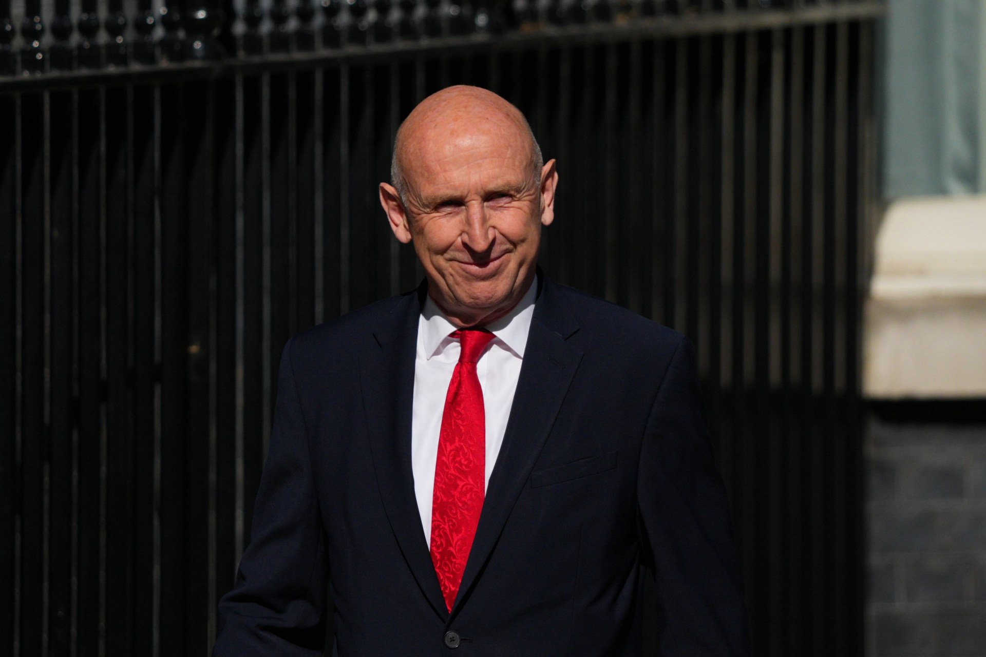 LONDON, ENGLAND - JULY 20: Former defence secretary John Healey reacts as he arrives in Downing Street on July 20, 2026 in London, England. New Labour leader Andy Burnham has assumed the office of Prime Minister of Great Britain and Northern Ireland today, pledging to reduce the cost of living with a new economic model. (Photo by Carl Court/Getty Images)