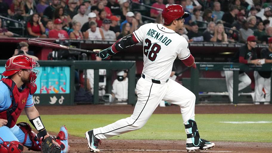Jul 18, 2026; Phoenix, Arizona, USA; Arizona Diamondbacks third baseman Nolan Arenado (28) hits a two-run double