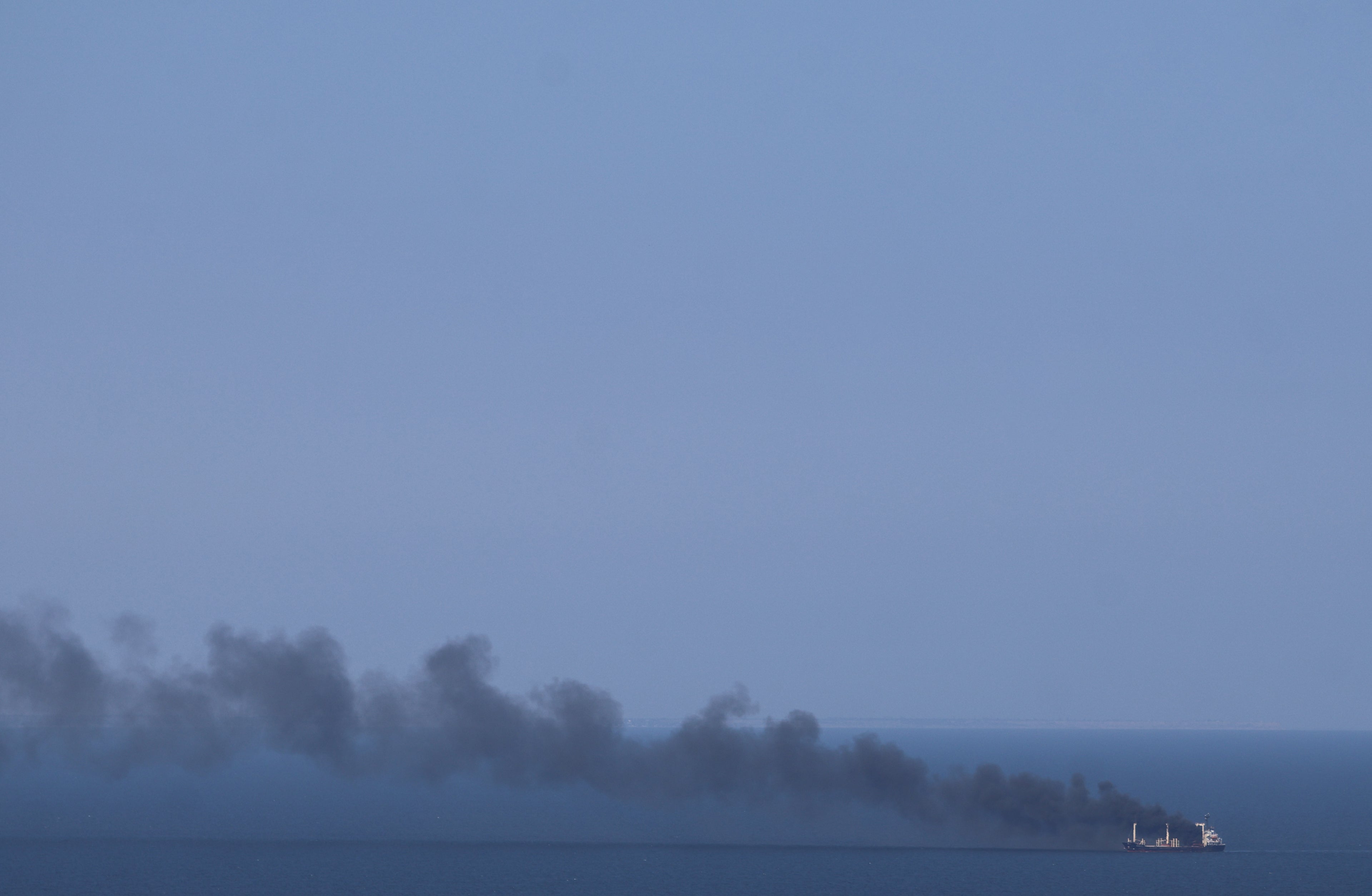 This photograph shows smoke rising from a civilian ship on the Black Sea off the coast of Odesa (AFP/Getty)