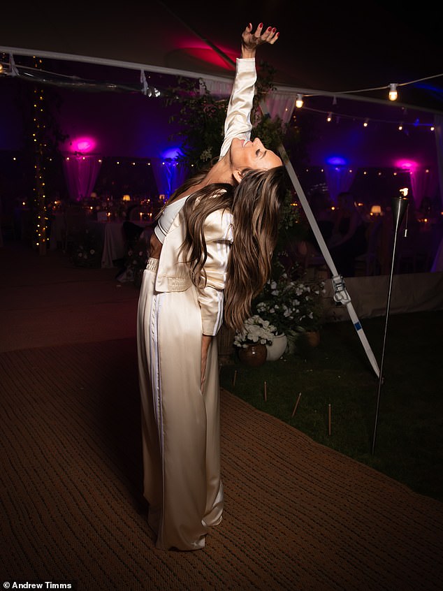 This look was again made from ivory silk with white silk stripes, worn with custom Superstar trainers
