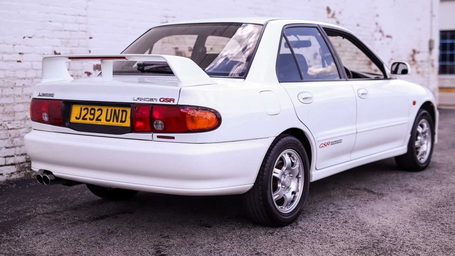 1992 Mitsubishi Lancer Evolution I White Rear Angled View