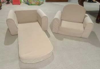Convertible children's furniture featuring a chair and a foldout sofa on a carpeted floor. Suitable for playrooms or kids' bedrooms