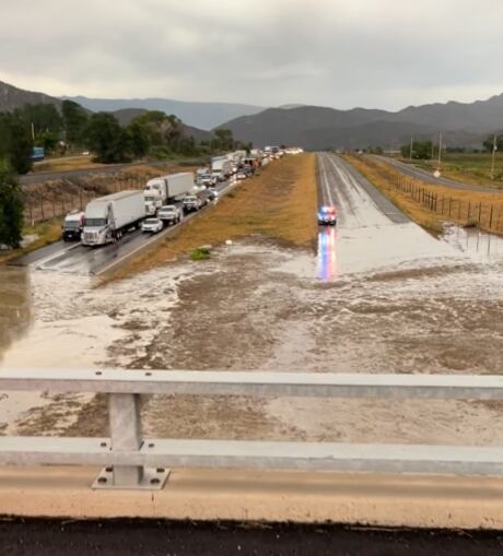 Floodwaters, mud keep Interstate 70 closed into Tuesday morning