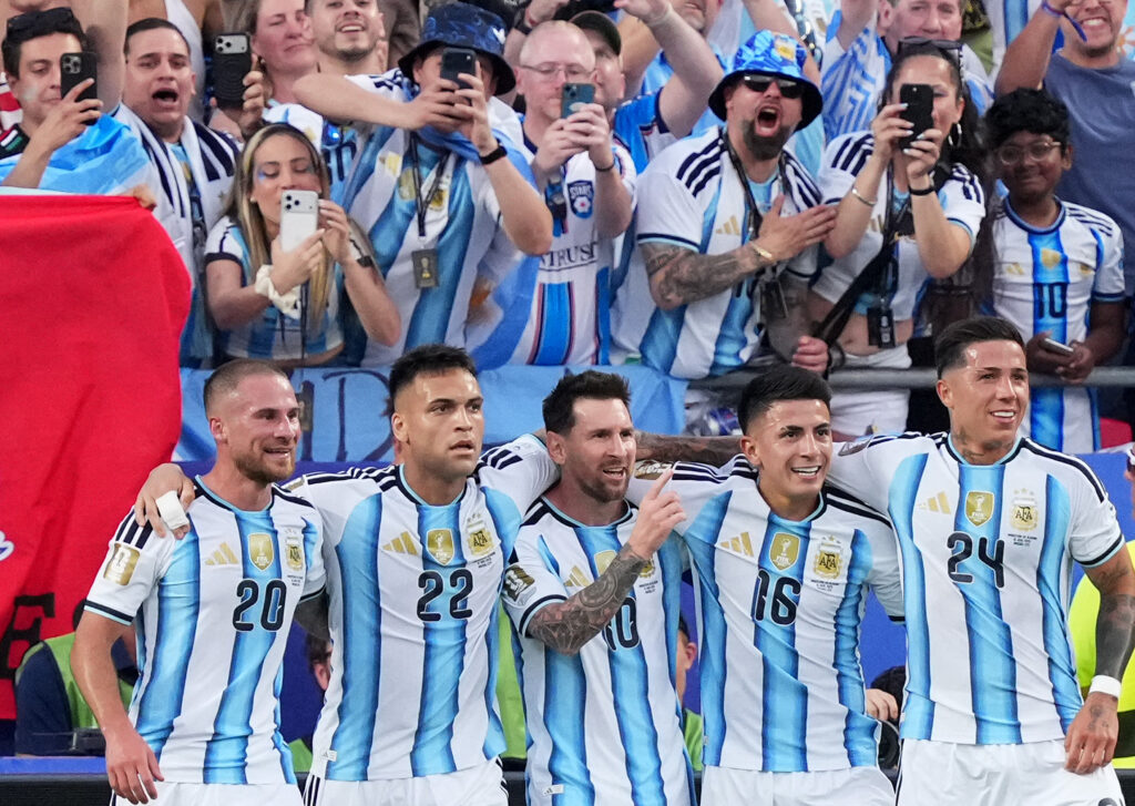 June 16, 2026; Kansas City, Missouri, U.S.; Argentina's Lionel Messi celebrates scoring their first goal with Alexis Mac Allister, Lautaro Martinez, Thiago Almada and Enzo Fernandez. Mandatory Credit: Jay Biggerstaff-Imagn Images