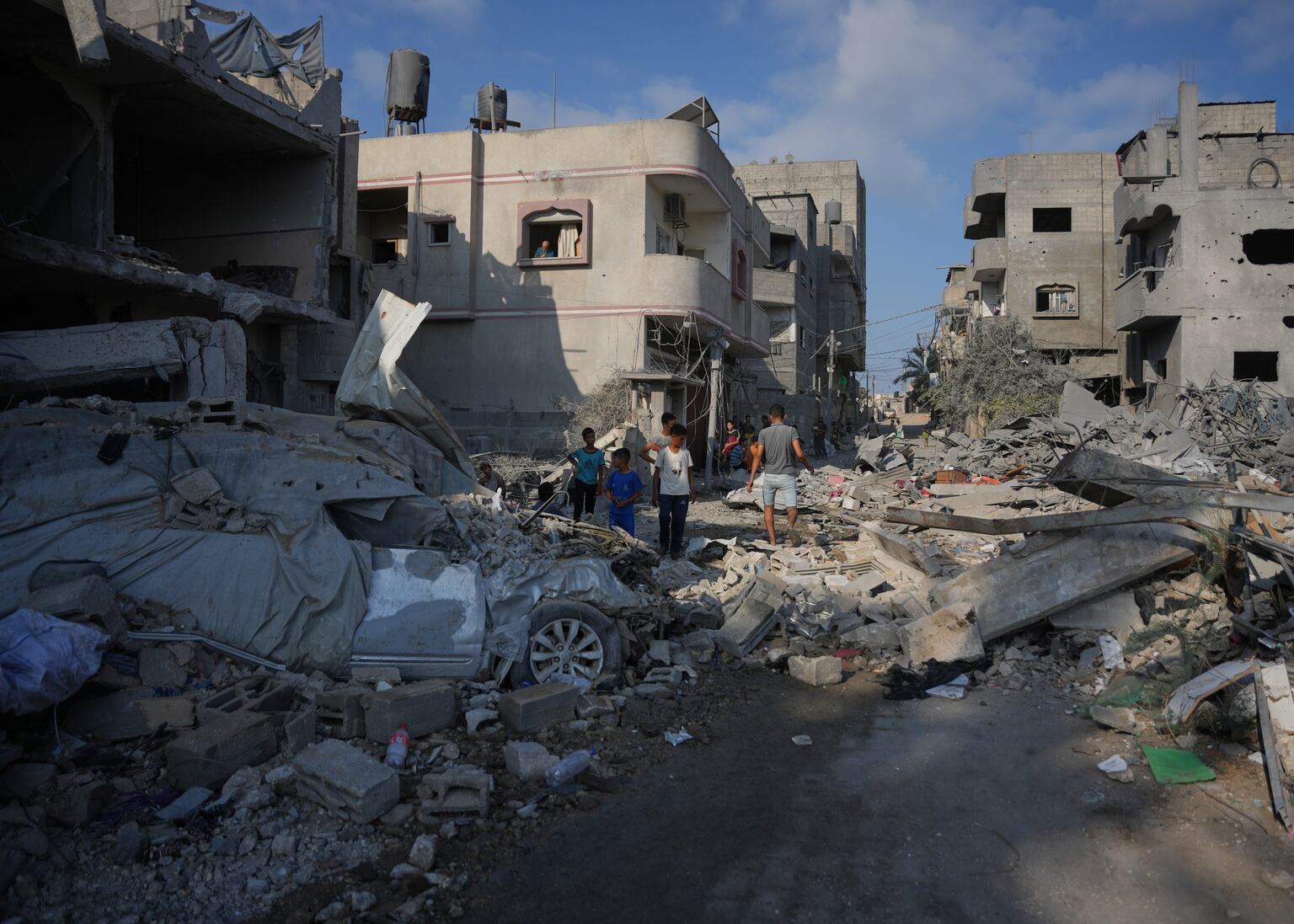 Destroyed buildings after an Israeli airstrike in Nuseirat, central Gaza Strip (Abdel Kareem Hana/AP)