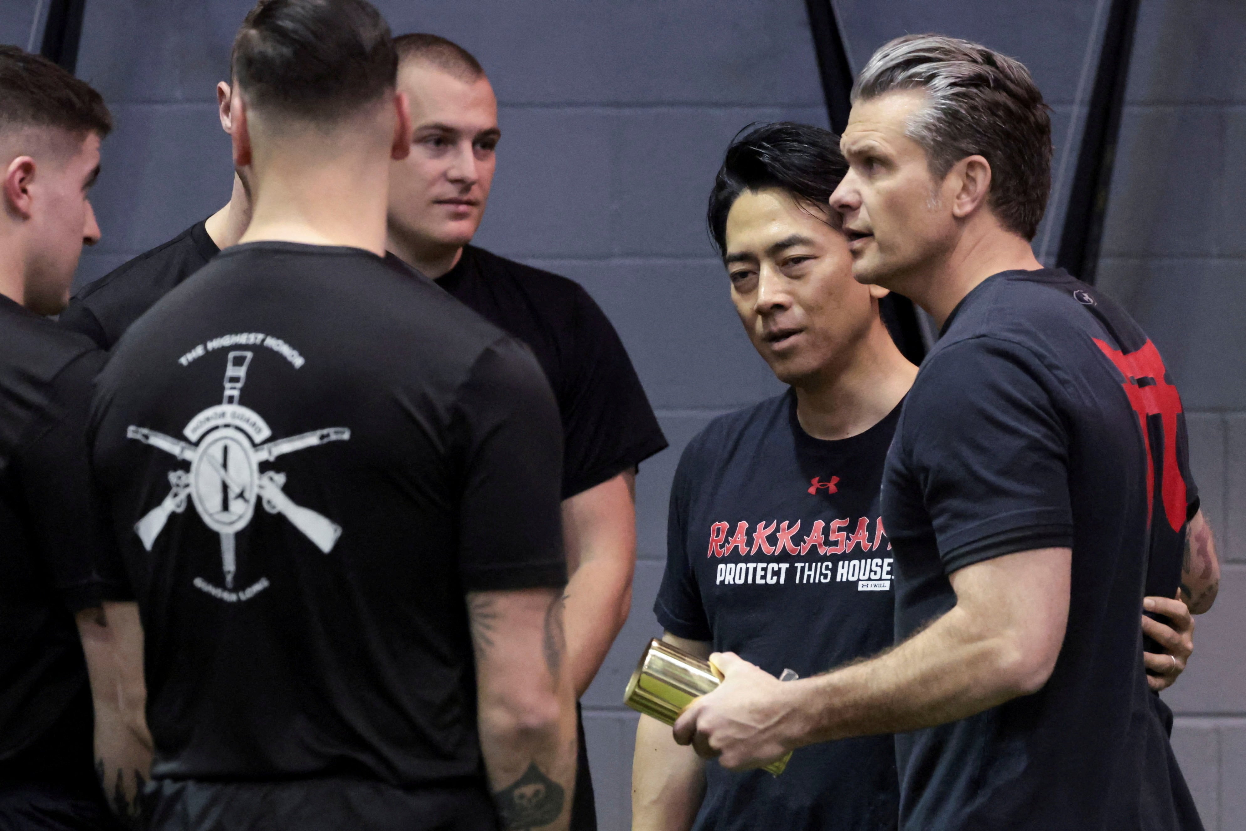 Pete Hegseth and Japanese Defense Minister Shinjiro Koizumi in the gym in January. / Jonathan Ernst / REUTERS