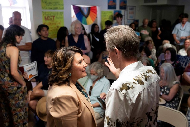 FILE PHOTO: JoAnna Mendoza, a Democratic candidate for US Congress, attends a campaign event in Arizona