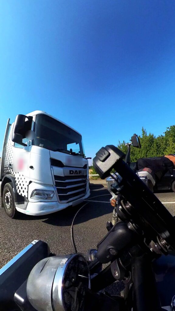 Motorcyclist’s terrifying near-miss with lorry driving head-on down wrong side of road