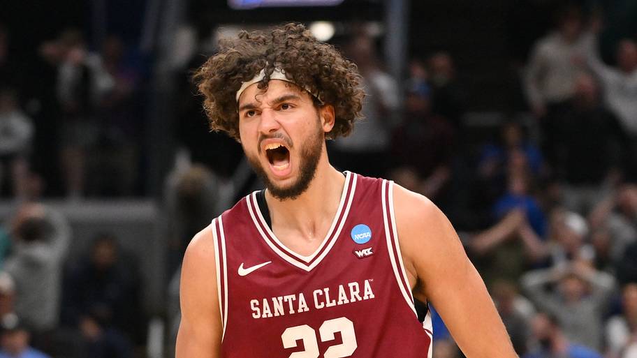Santa Clara Broncos forward Allen Graves reacts after making a basket against the Kentucky Wildcats
