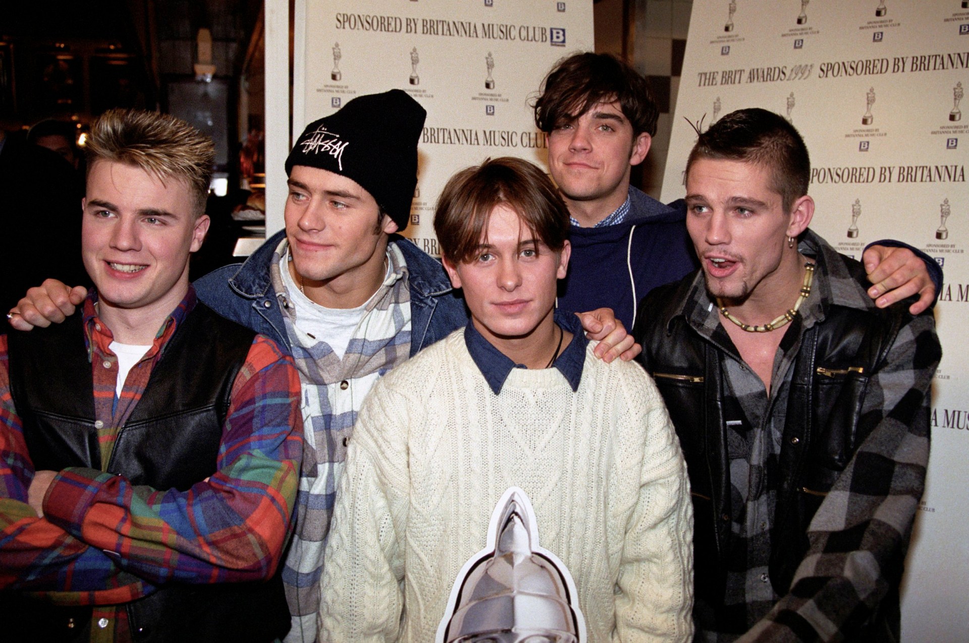 Gary Barlow, Howard Donald, Mark Owen, Robbie Williams and Jason Orange pictured together at the 1993 Brit Awards