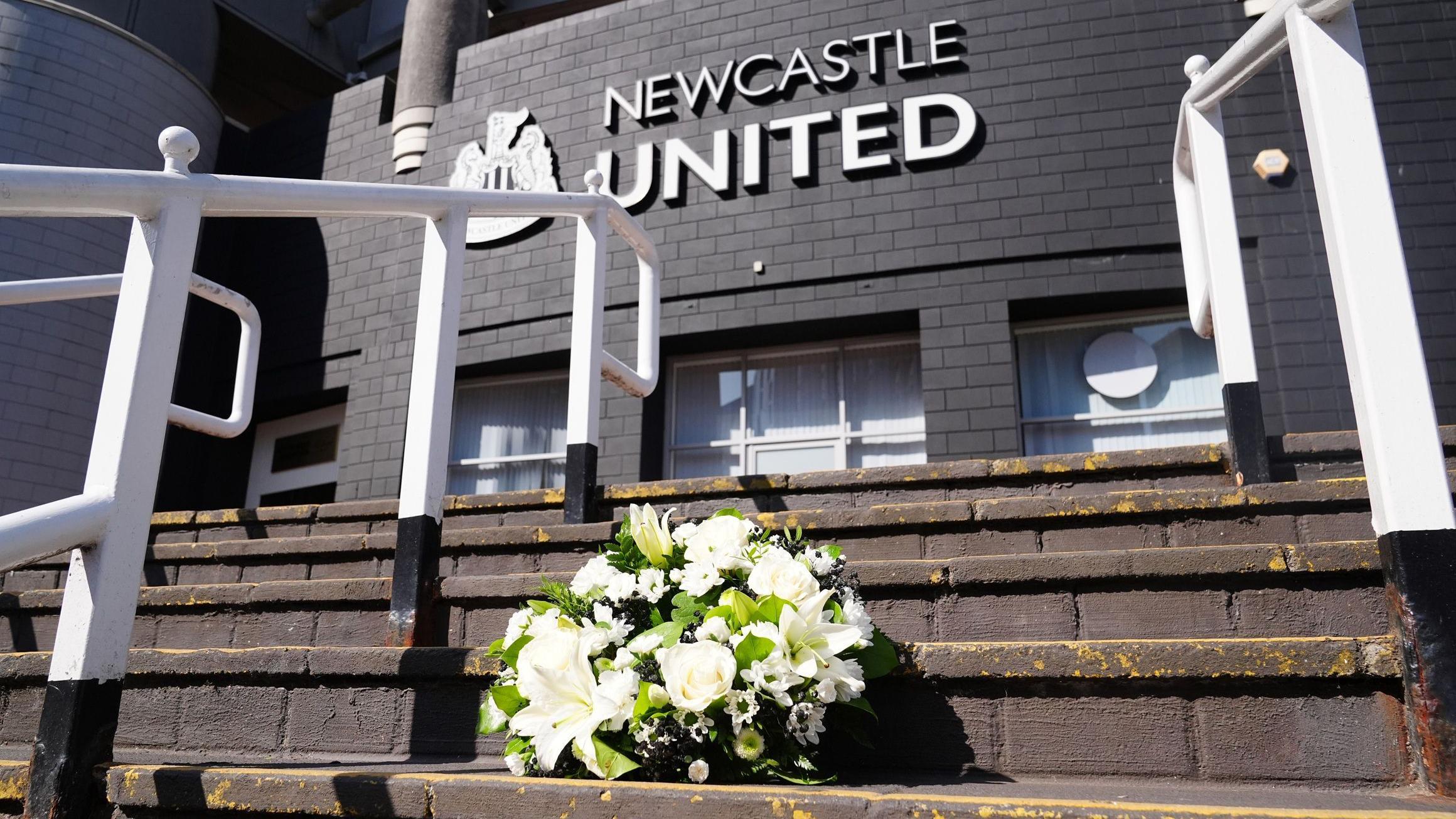 Flowers have been laid outside St James' Park to honour the Newcastle former player and manager
