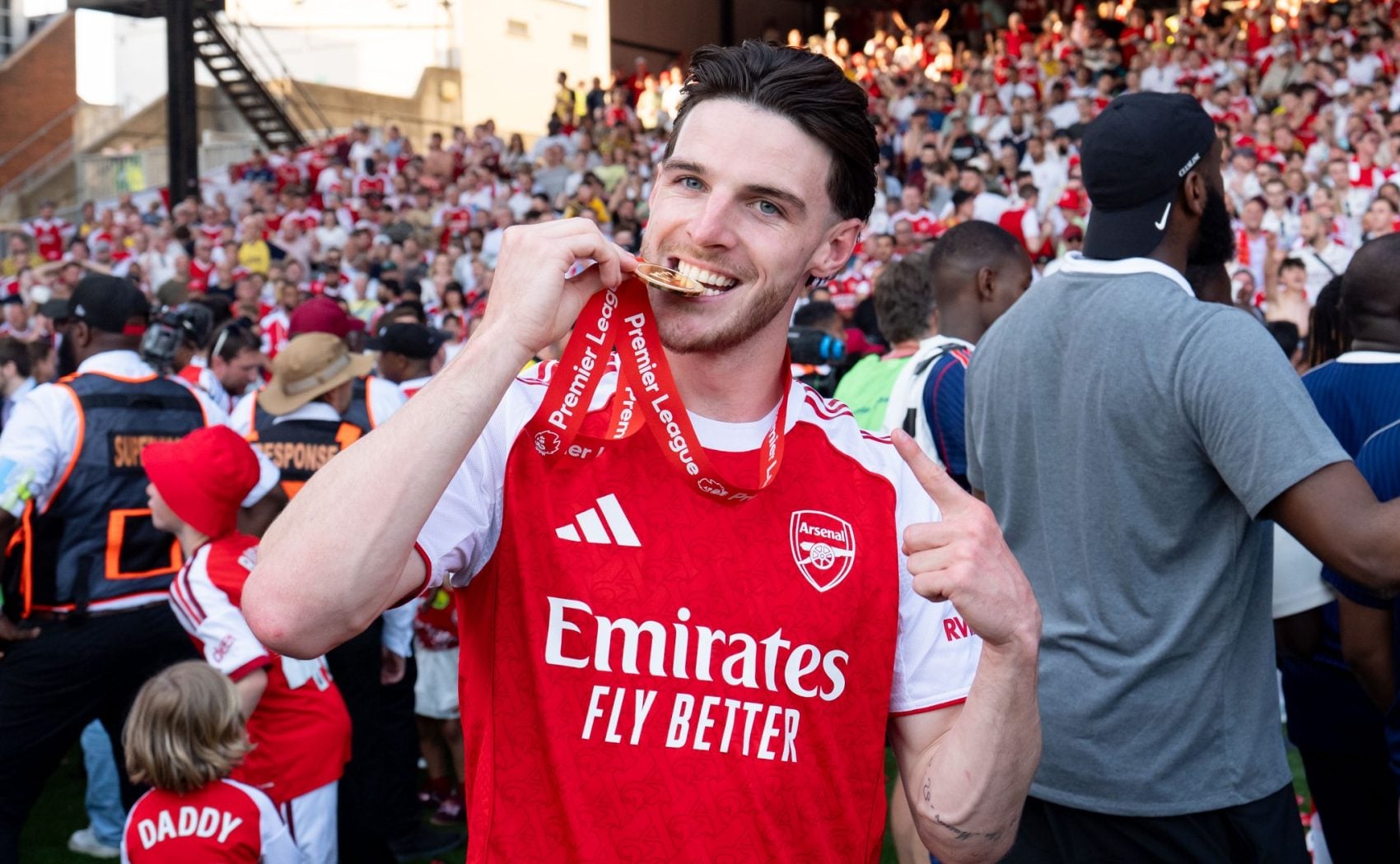 Declan Rice celebrates Arsenal's first Premier League triumph of the Emirates era