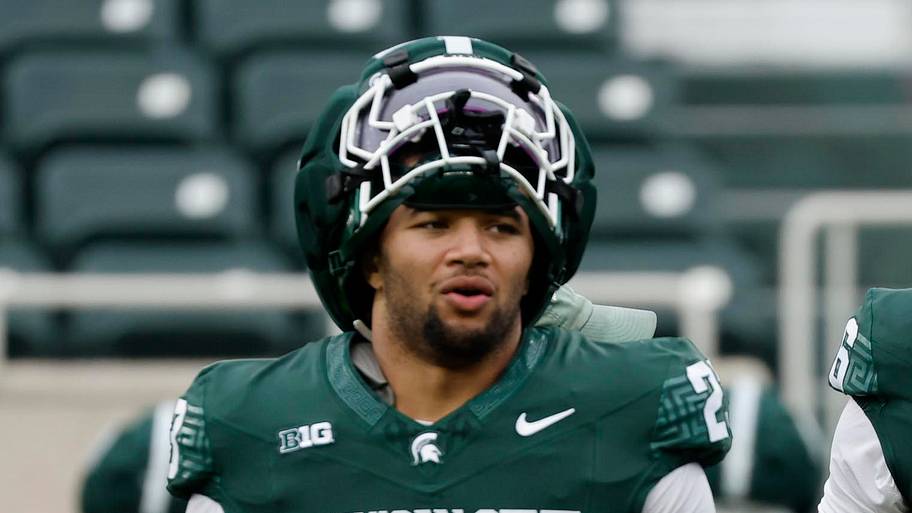 Michigan State Spartans linebacker Kenny Soares Jr. (23) and defensive lineman Eli Coenen (96)