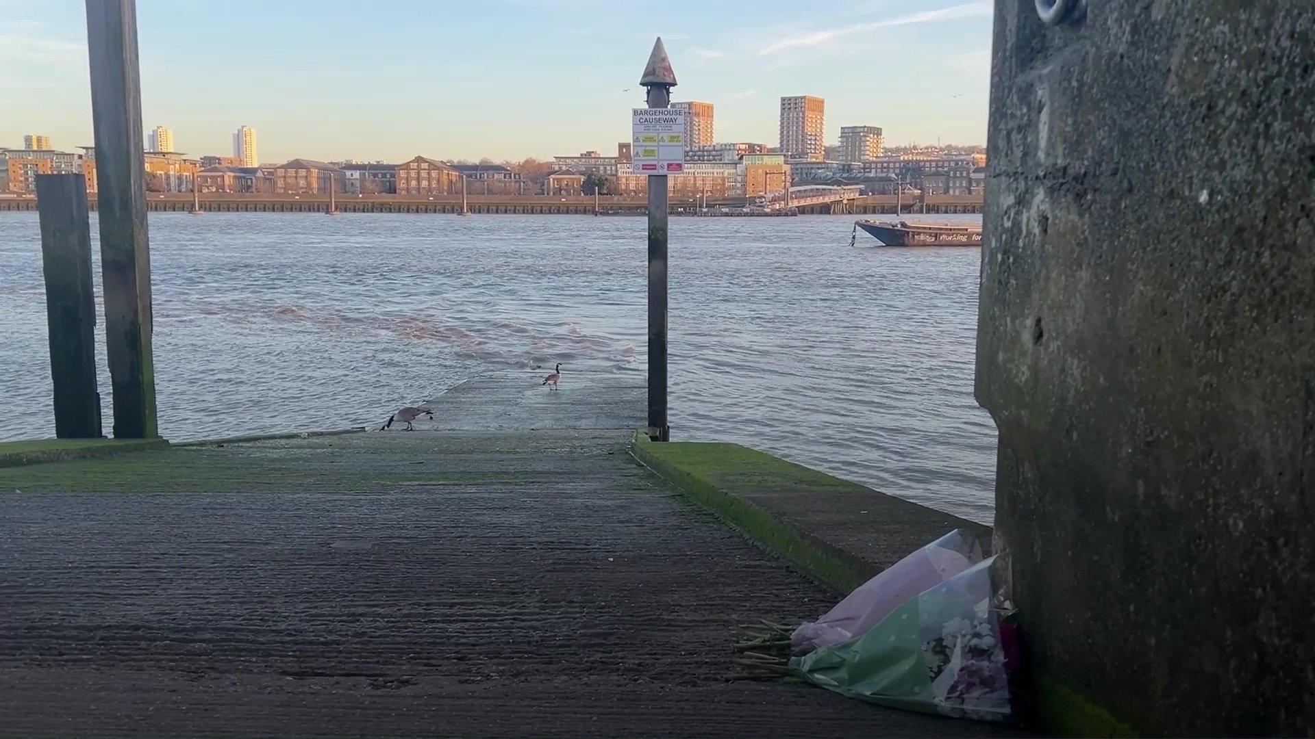 15992887 Grab from PA video of Barge House Causeway, near London City Airport, near to where an 11-year-old girl went missing after she entered the River Thames on Monday, she has been named by the Metropolitan Police as Kaliyah Coa. Image date: Tuesday April 1, 2025. PA Photo. See PA story POLICE Thames. Photo credit should read: Pol Allingham/PA Wire