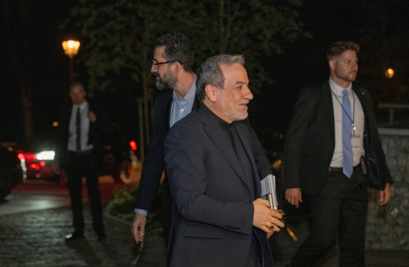 Minister of Foreign Affairs of Iran, Seyyed Abbas Araghchi, centre, at the Buergenstock resort in Obbuergen, near Lucerne, Switzerland, Sunday, June 20, 2026. (credit: Urs Flueeler/Pool via REUTERS)
