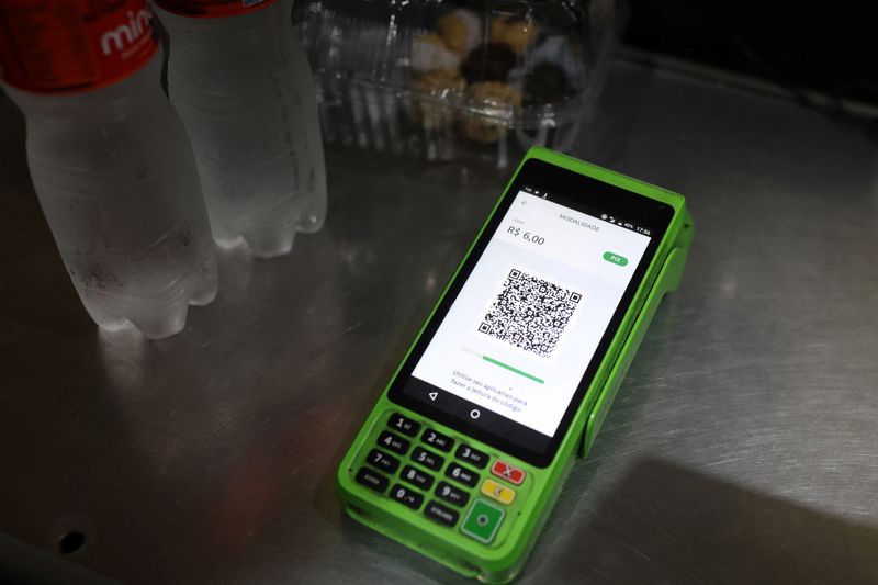 A QR code of the instant electronic payment mode known as PIX, is seen on a payment machine at a store in Rio de Janeiro