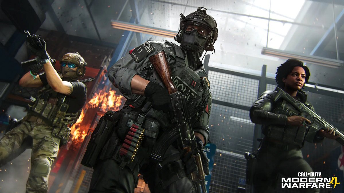 Call of Duty Modern Warfare 4 three armed soldiers posing inside a warehouse