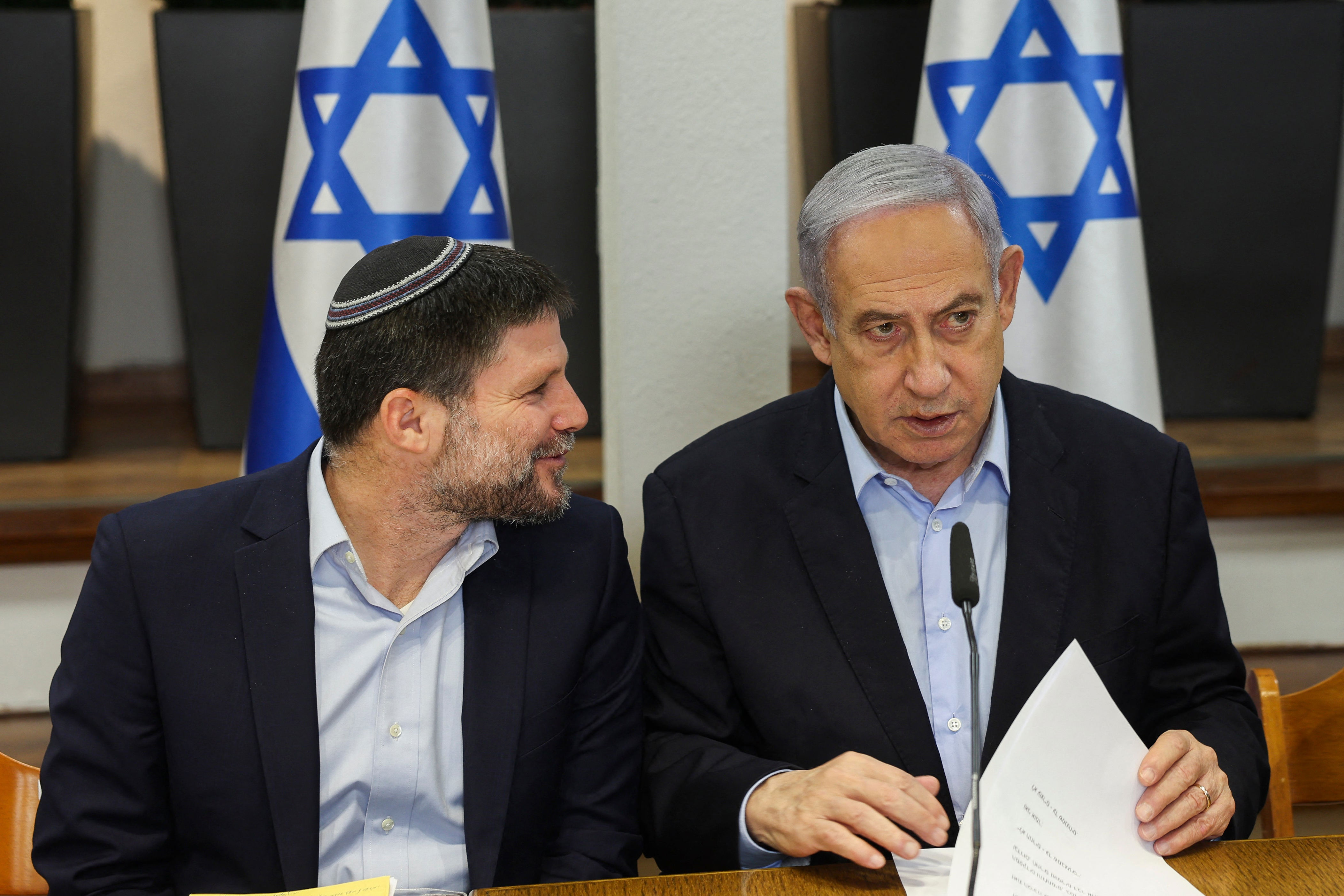 Netanyahu’s minister of finance Bezalel Smotrich, left, may be targeted by Lord Cameron’s sanctions (AFP/Getty)