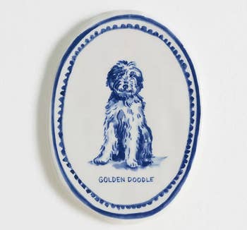 Ceramic oval plate featuring an illustration of a dog labeled