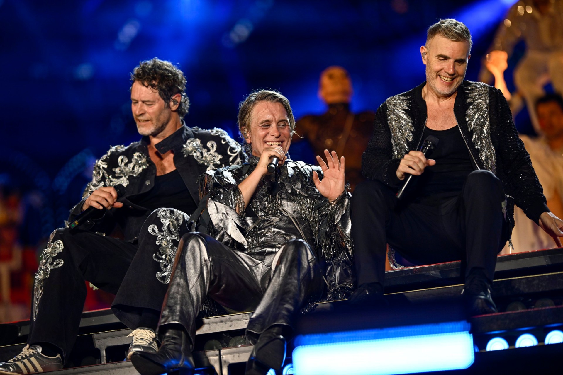 Howard Donald, Mark Owen and Gary Barlow of Take That perform live on stage during the The Circus Live stadium tour at The London Stadium on June 26, 2026