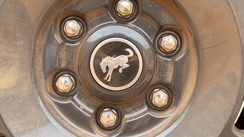 Ford Bronco wheel logo close up