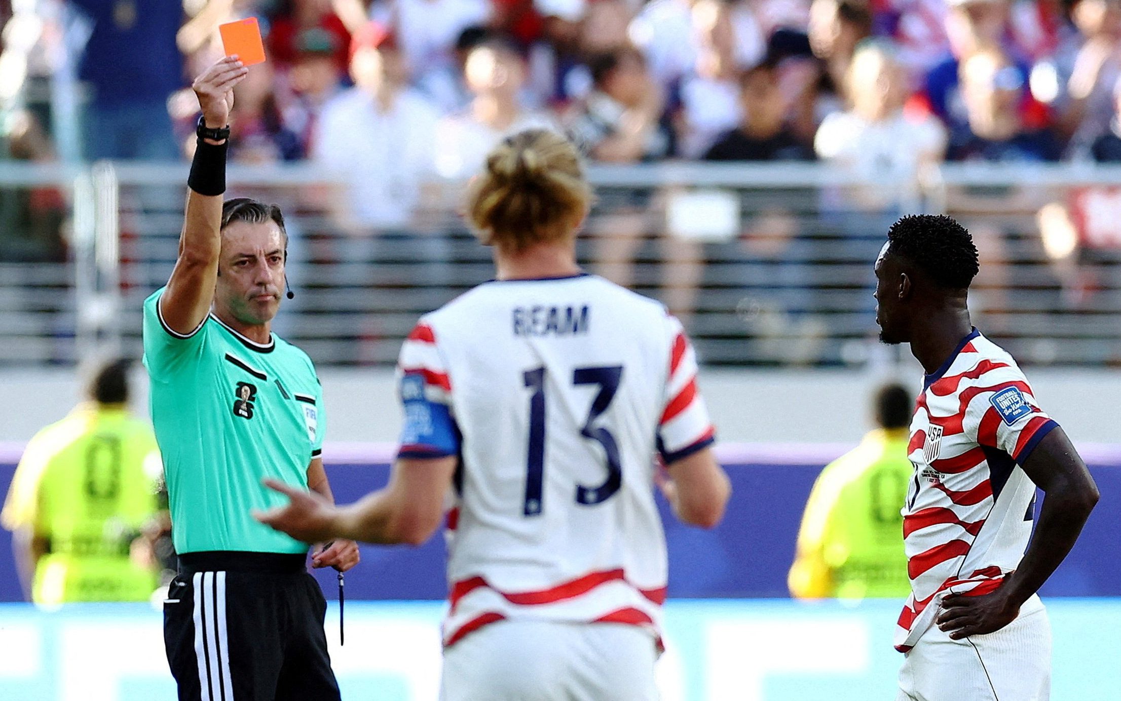Francisco Bay Area Stadium, Santa Clara, California, U.S. - July 1, 2026 Folarin Balogun of the U.S. is shown a red card by referee Raphael