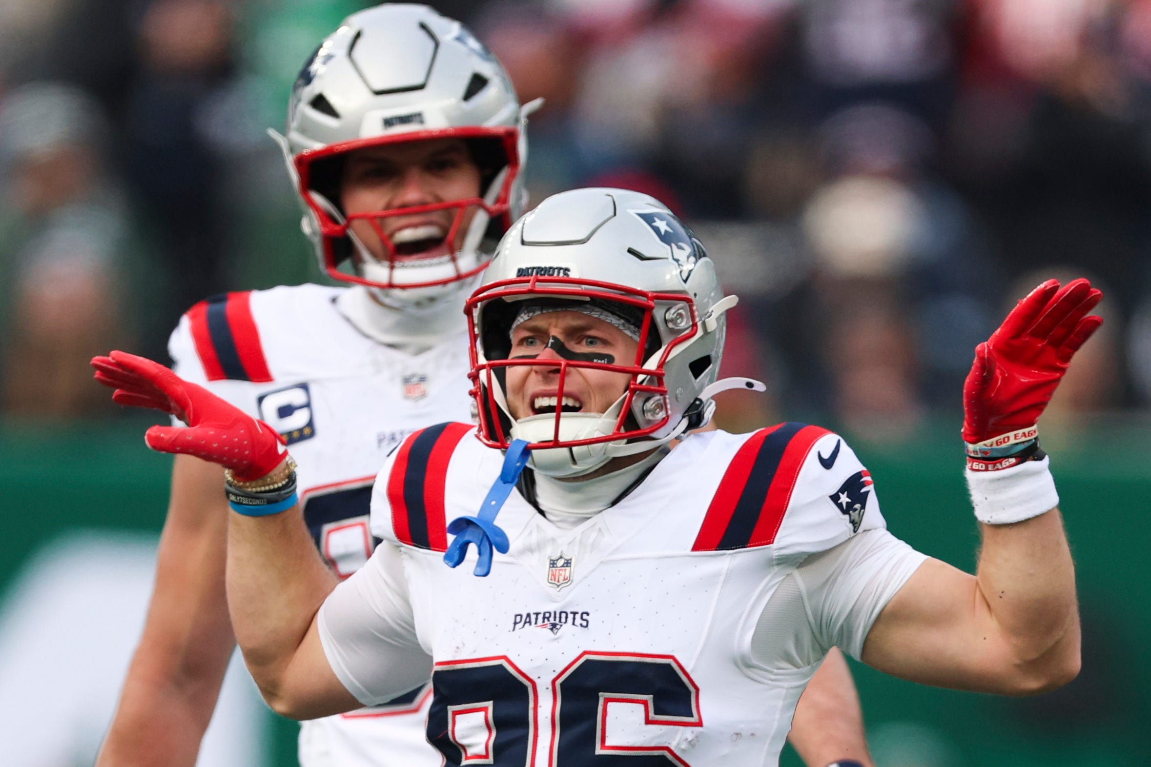 Dec 28, 2025; East Rutherford, New Jersey, USA; New England Patriots wide receiver Efton Chism III (86) celebrates after a catch against the New York Jets during the first quarter of the game at MetLife Stadium. Mandatory Credit: Vincent Carchietta-Imagn Images