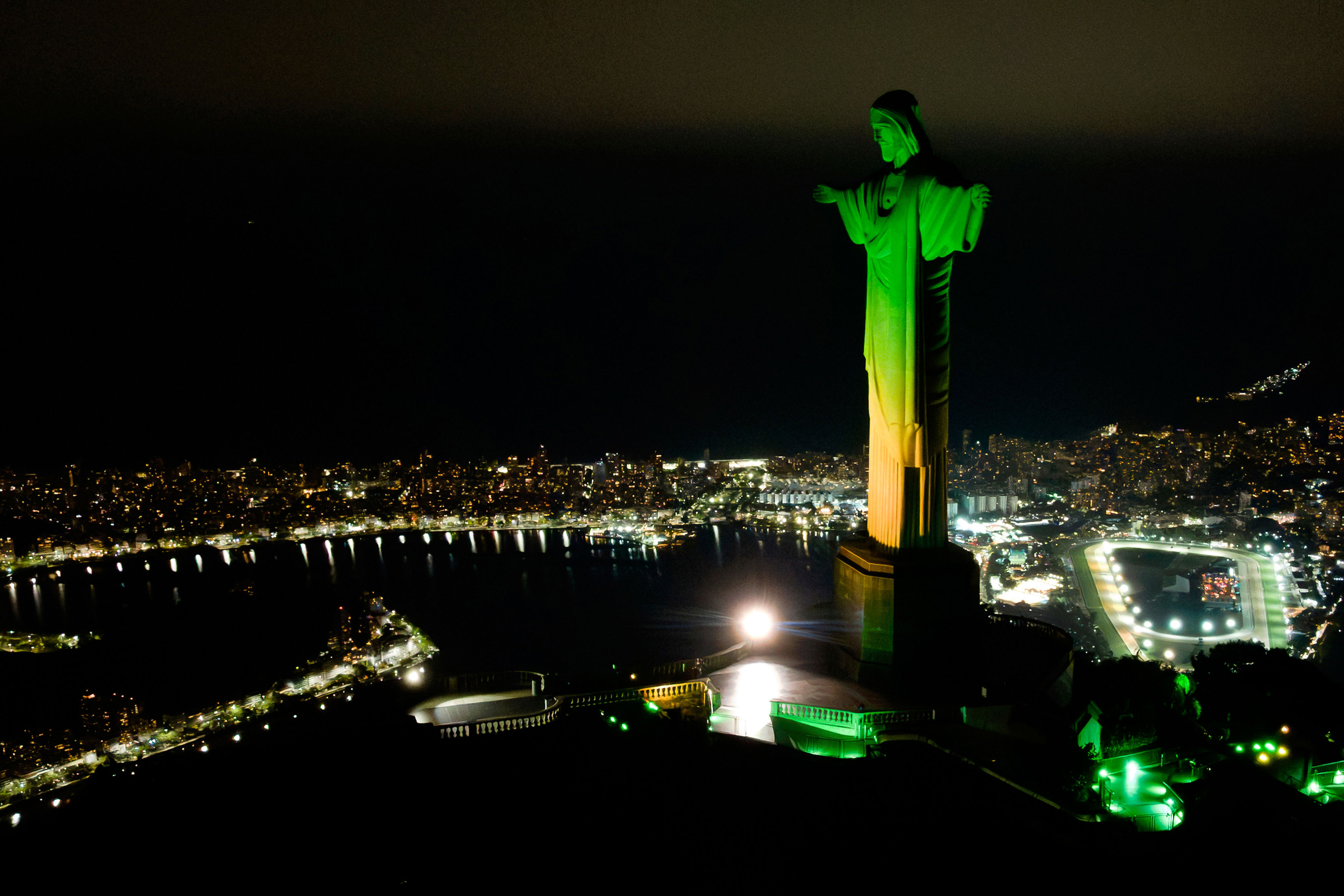 Christ the Redeemer monument is illuminated in Brazil's national colors as part of the countdown to the 2027 FIFA Women's World Cup, in Rio de Janeiro, Brazil, Tuesday, June 23, 2026. (AP Photo/Dhavid Normando)