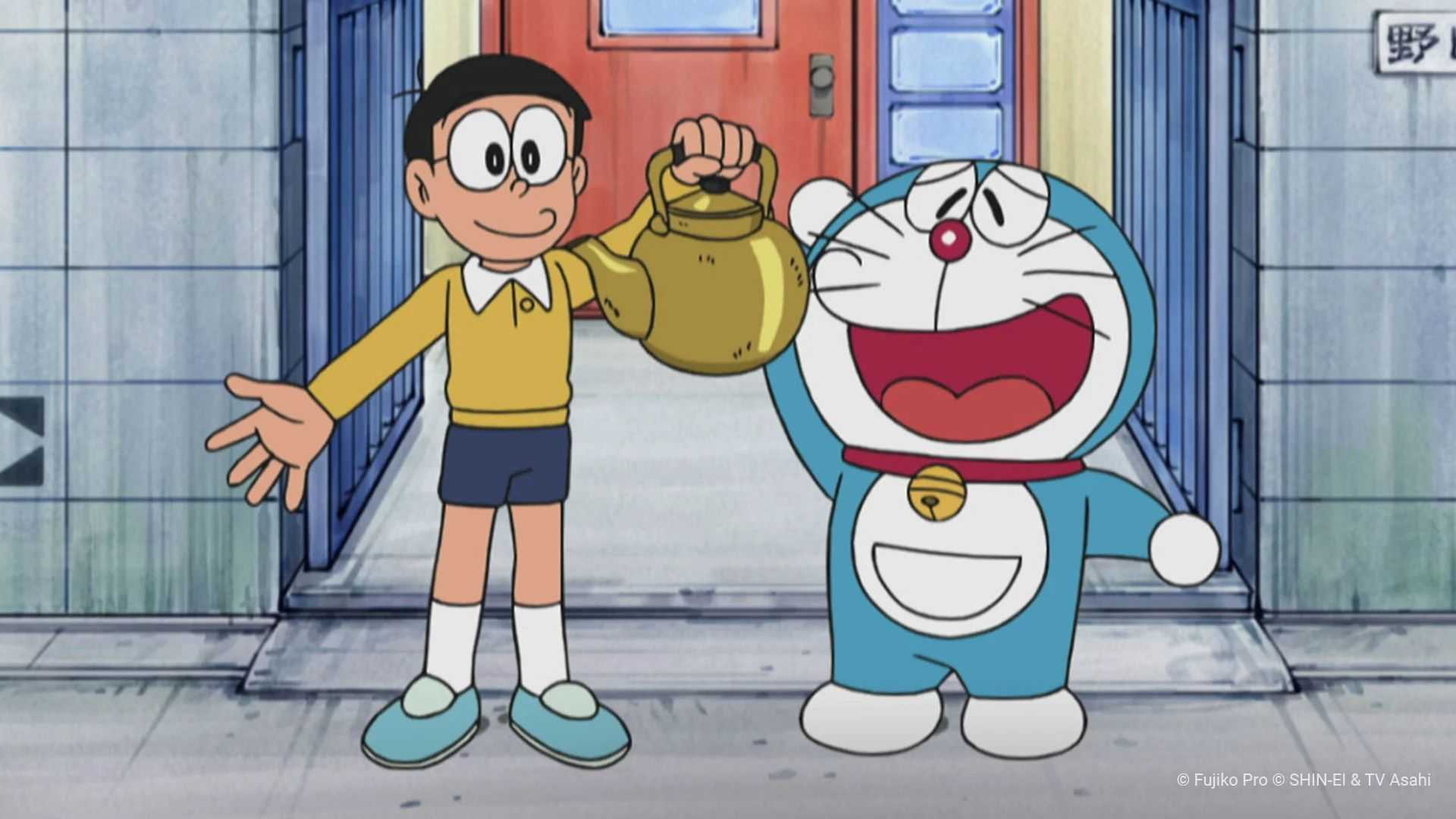 Doraemon looks with a pleased face as Nobita handles a teapot