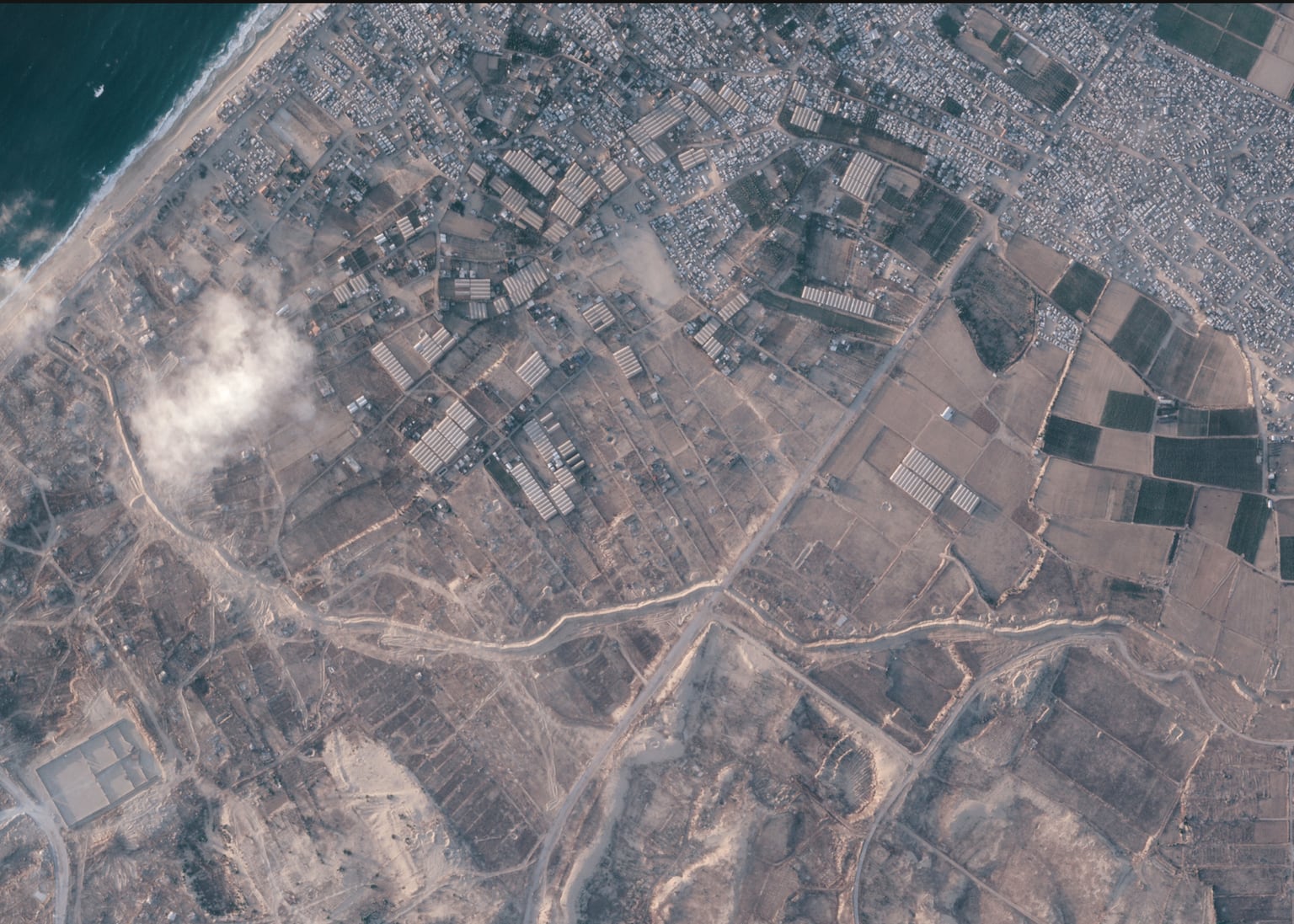 Israel builds miles-long earth barrier inside Gaza