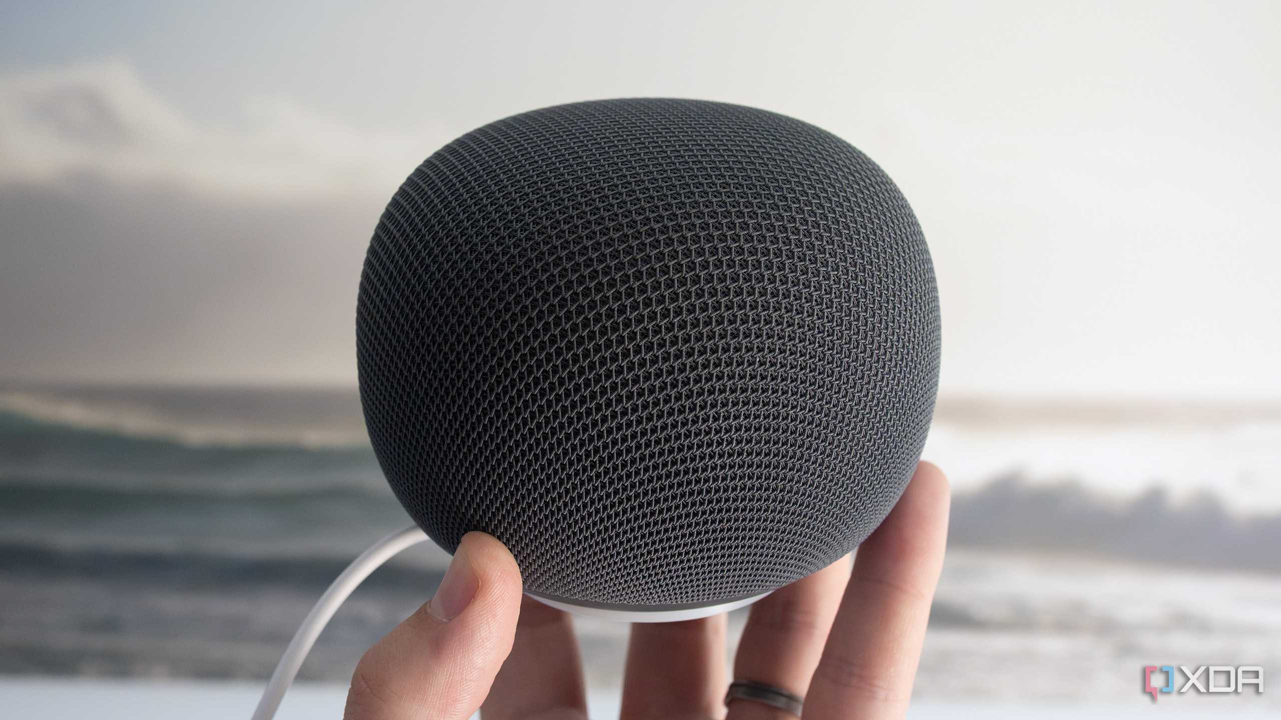 Holding the new Google Home Speaker