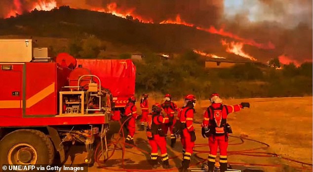 This screen grab taken from handout video footage released on July 16, 2026, by Spain's Military Emergencies Unit (UME) shows the military fighting a massive wildfire in a sparsely populated part of the Aragon region in northeastern Spain