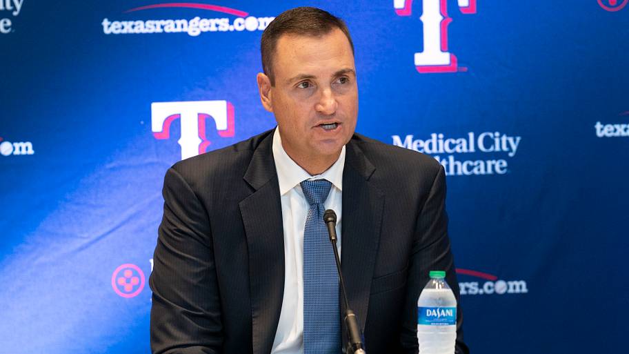 Texas Rangers president of baseball operations Chris Young speaks to reporters behind a microphone