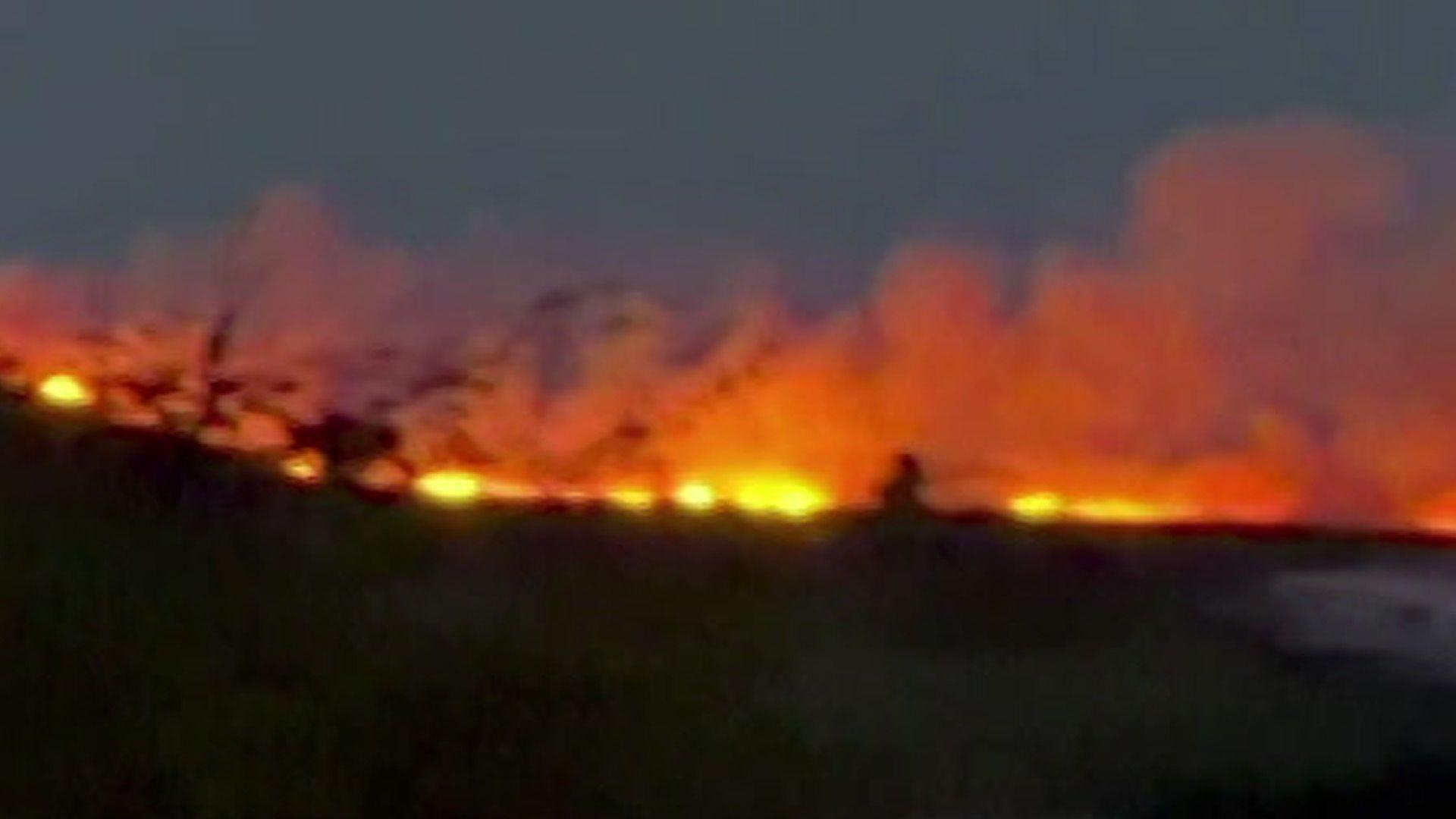 Smoke from mountain wildfire the size of 120 football pitches smelled 30 miles away