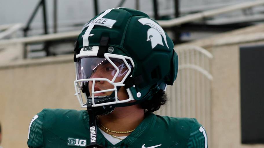 Michigan State Spartans rush end Anelu Lafaele (11) walks onto the field for MSU's