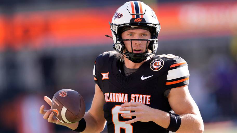 Oklahoma State's Zane Flores (6) warms up before game.