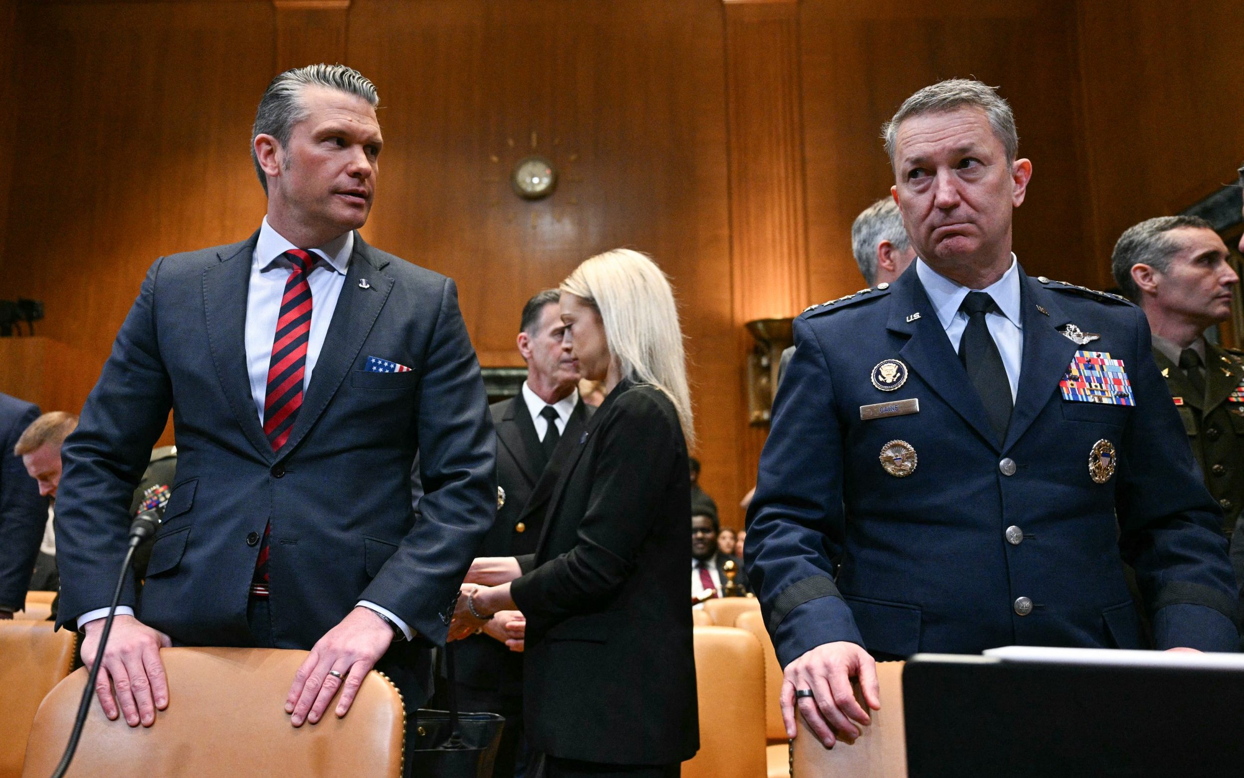 Pete Hegseth, the secretary of defence, and Gen Dan Caine, the chairman of the joint chiefs of staff, arrive for a defence budget hearing on Capitol Hill