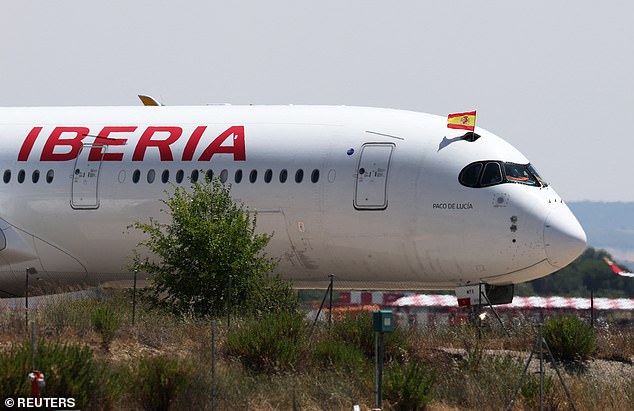The airplane arrived hours later as the city of Madrid readied a welcome home fit for heroes