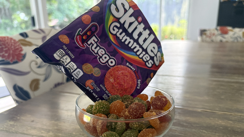Skittles Fuego in glass bowl on wooden table