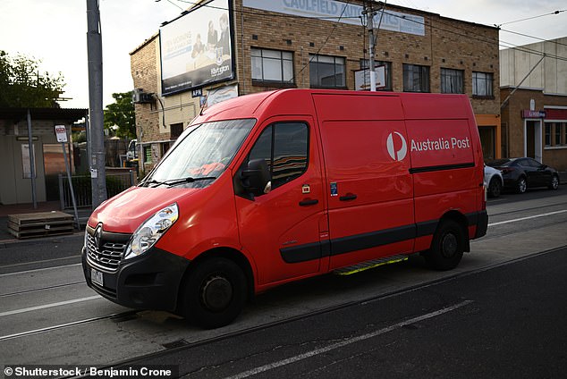 An Australia Post worker claimed he was unfairly fired after driving his delivery van to a KFC