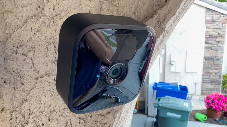 A Blink security camera mouted outside a house