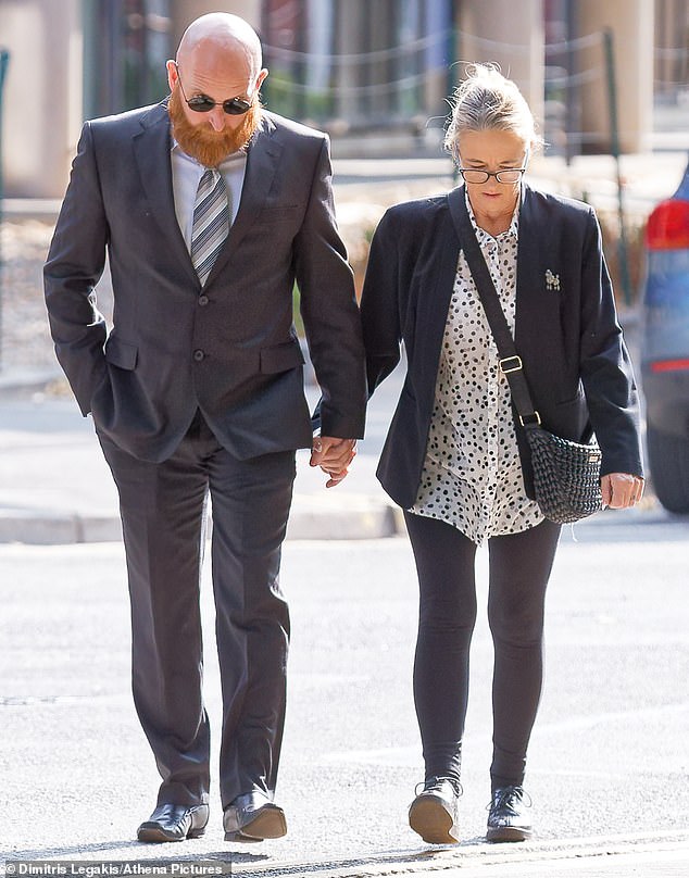 Neil Lewis is seen arriving at Cardiff Magistrates Court today. He has admitted wrongly passing the MOT of an unsafe car